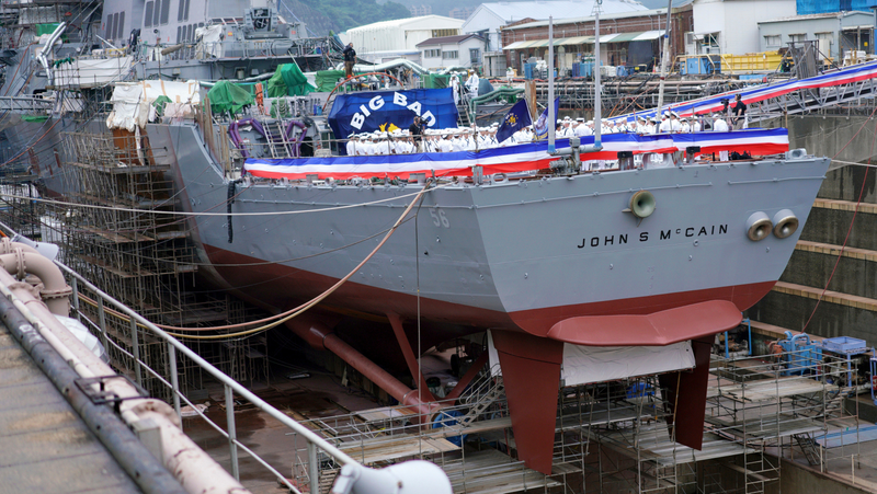 The USS John S. McCain undergoing repairs in dry dock at Yokosuka Naval Base in July, 2018.